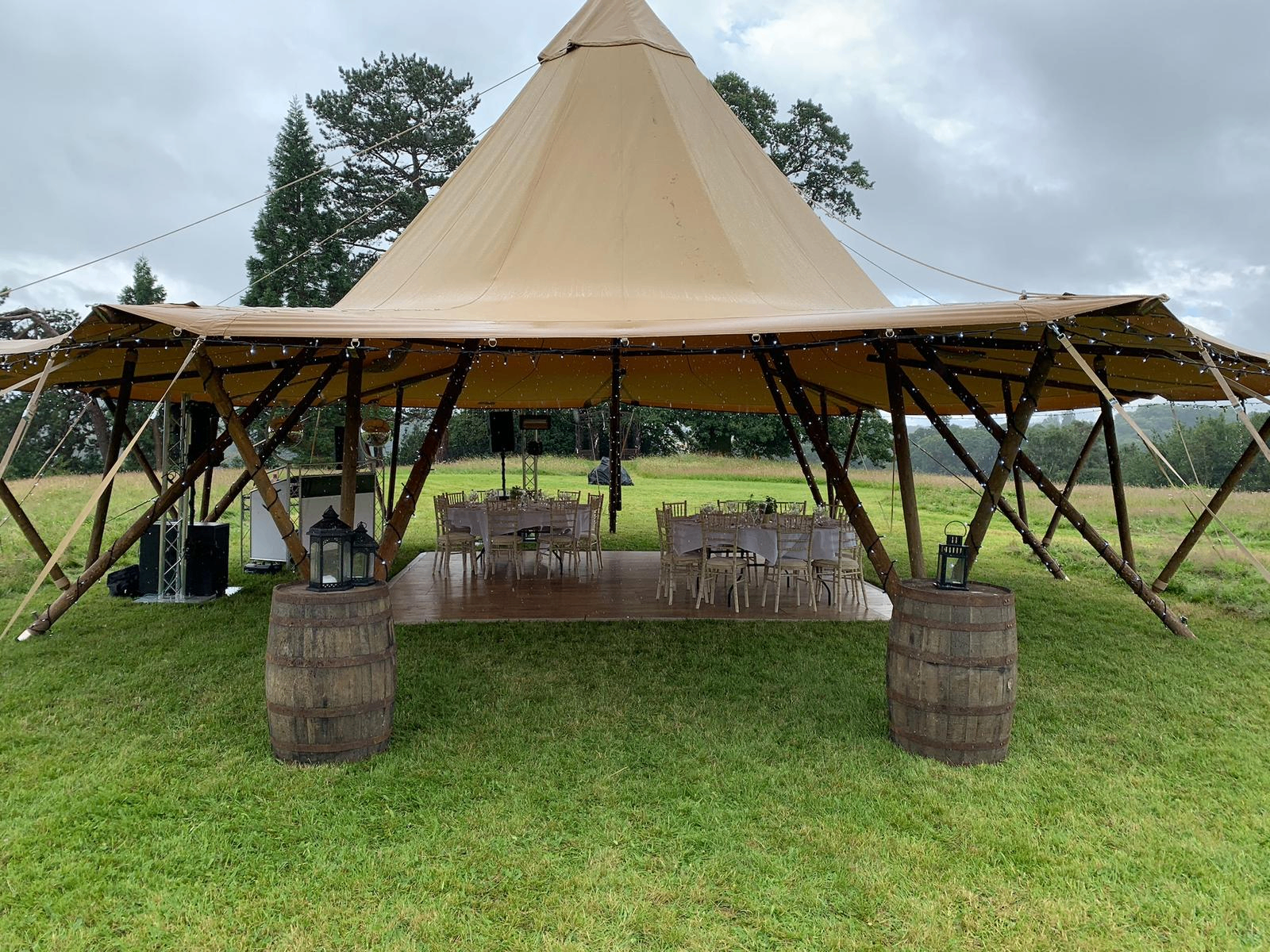 Cheshire Stretch Tents tipi and stretch tent set up for a countryside wedding