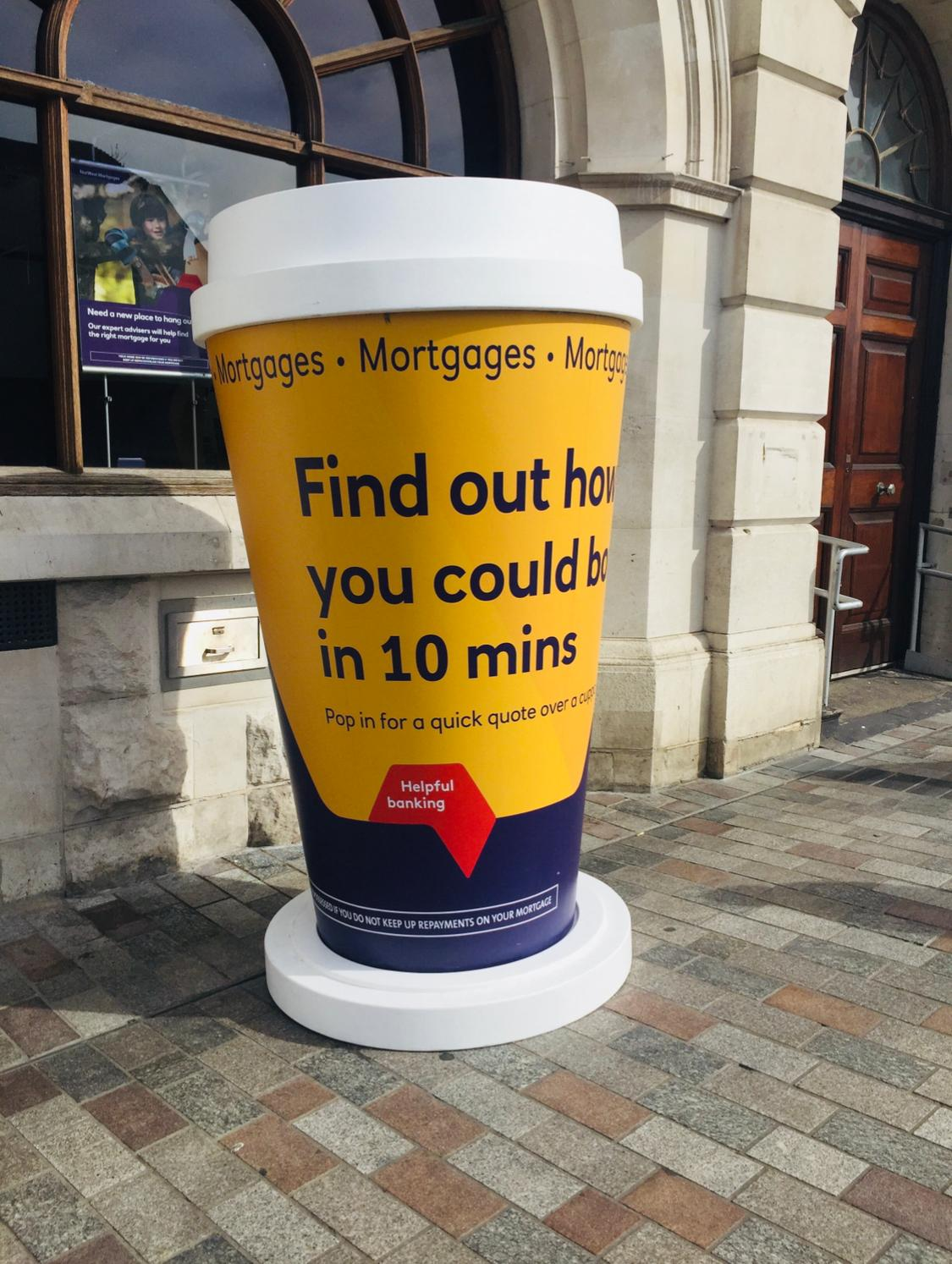 Oversized branded coffee cup prop supplied as part of a promotional event hire